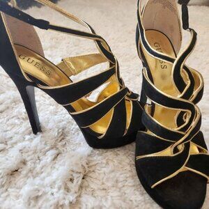 Black and gold GUESS shoes